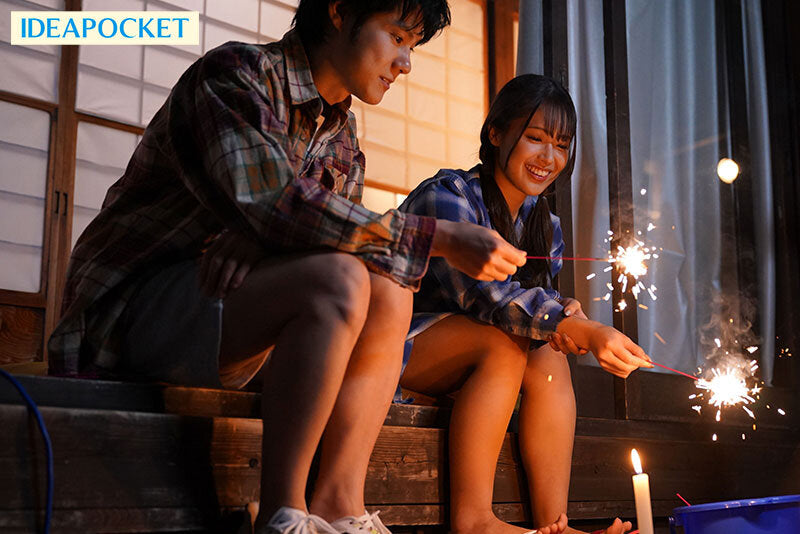 Mitsuri Nagahama japanese adult actress jav screenshot scene from lewd erotic dvd movie video beautiful busty asian woman and friend smiling and playing with sparklers at night 
